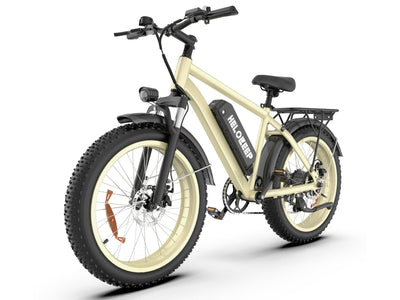Fat tire electric bike with beige frame, rear rack, and front suspension, ideal for commuting